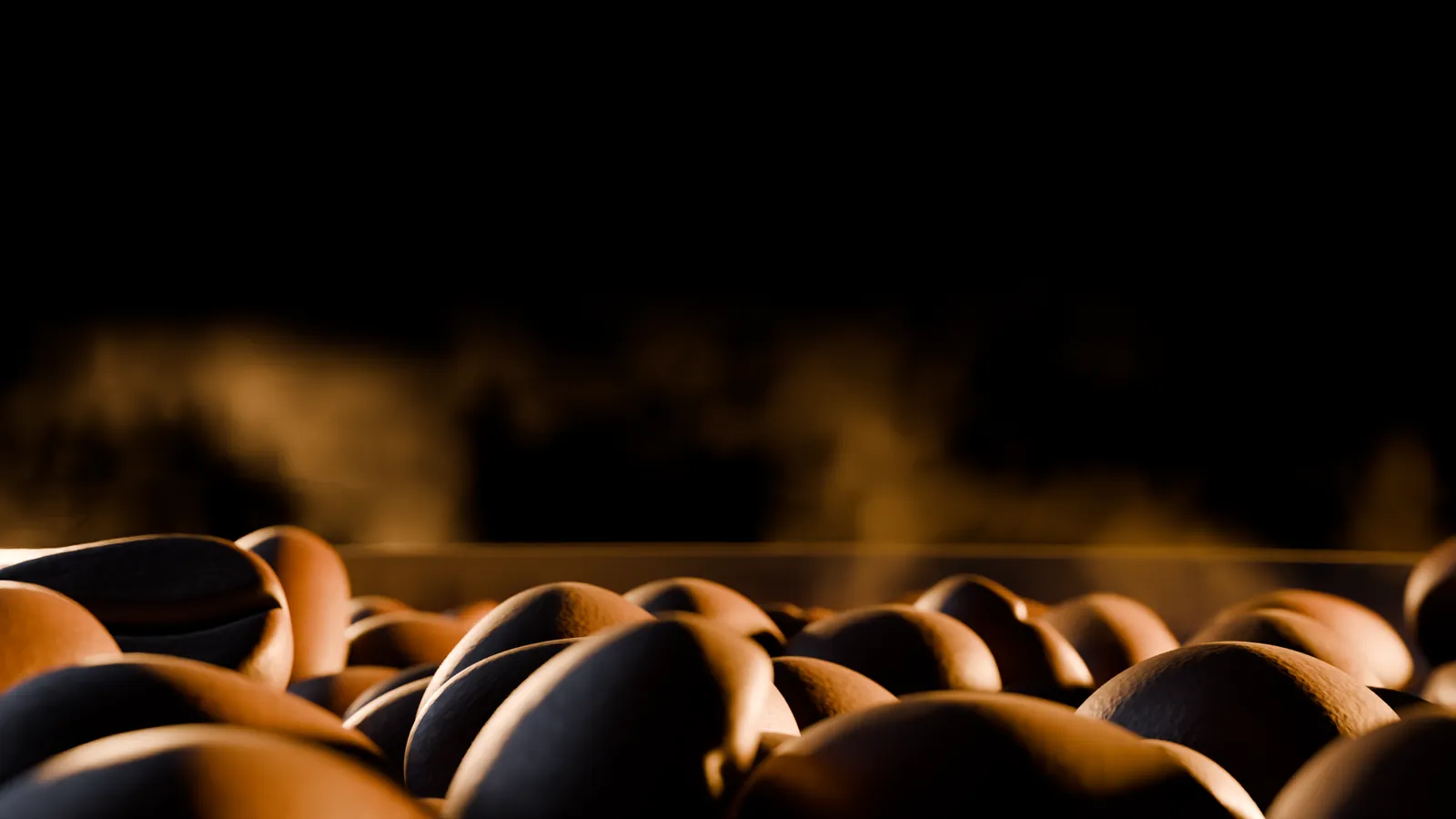 Roasted coffee beans cooling in the dark